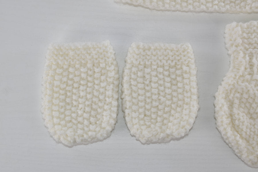 Handmade knitted newborn set