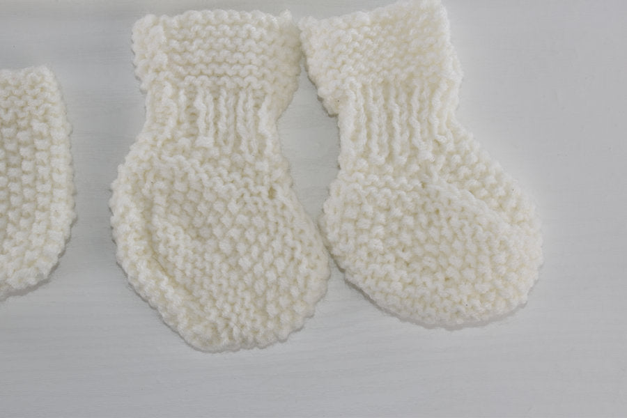 Handmade knitted newborn set