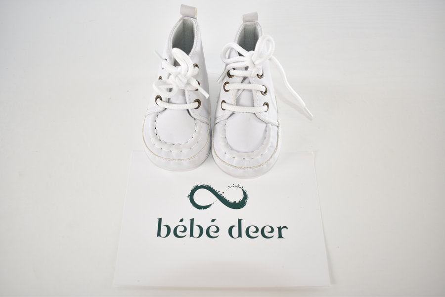 Chaussures premiers pas à semelle souple blanches