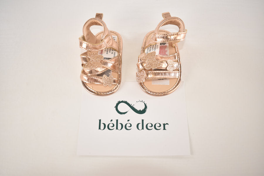 Rose gold butterfly sandals