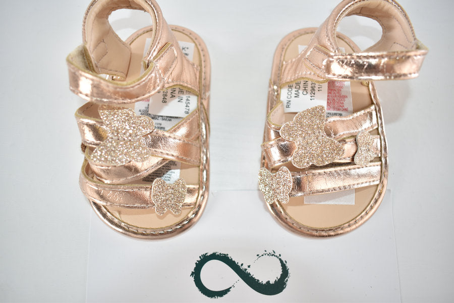 Rose gold butterfly sandals