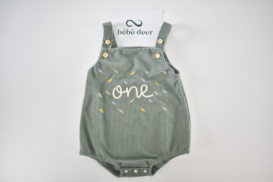 Green velour dungaree romper