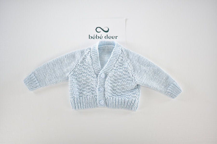Soft blue handmade knitted cardigan