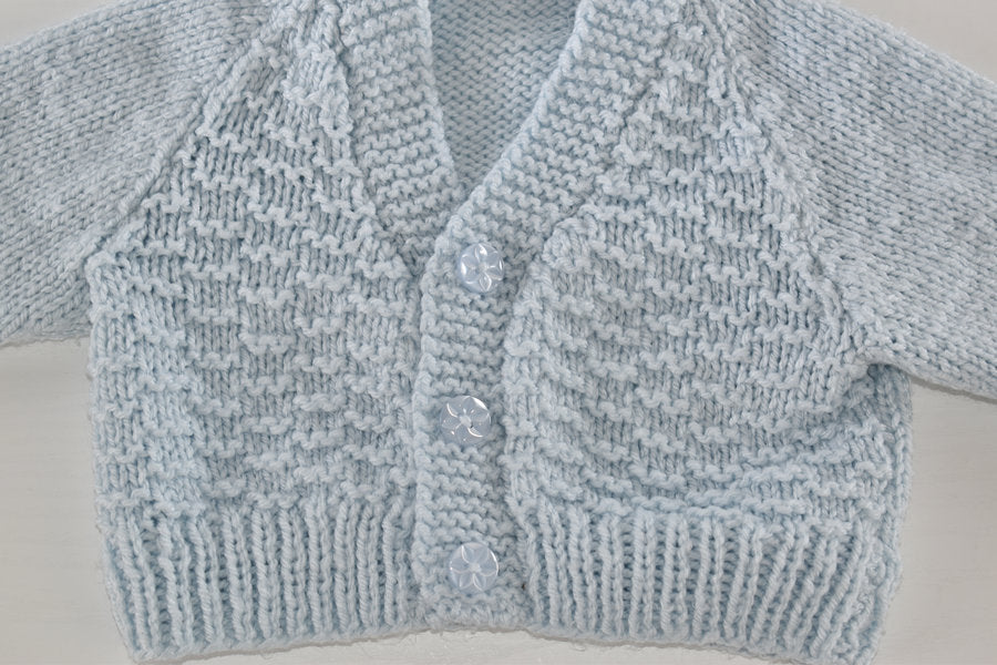 Soft blue handmade knitted cardigan