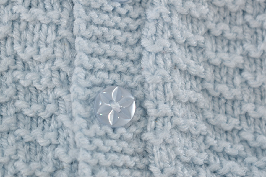 Soft blue handmade knitted cardigan