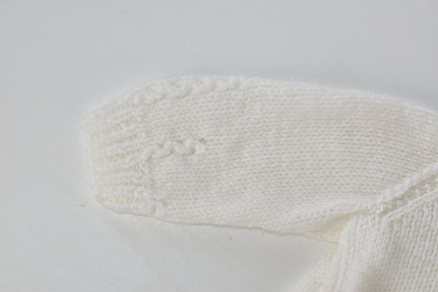 Handmade knitted white cardigan