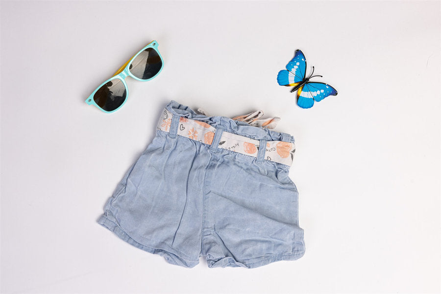 Denim-style shorts with peach motifs