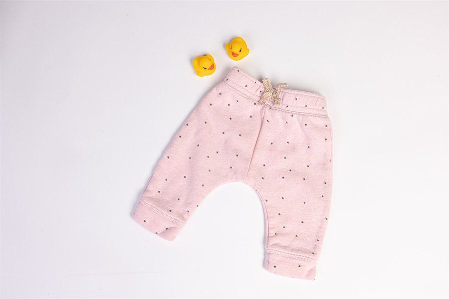 Pink trousers with black stars