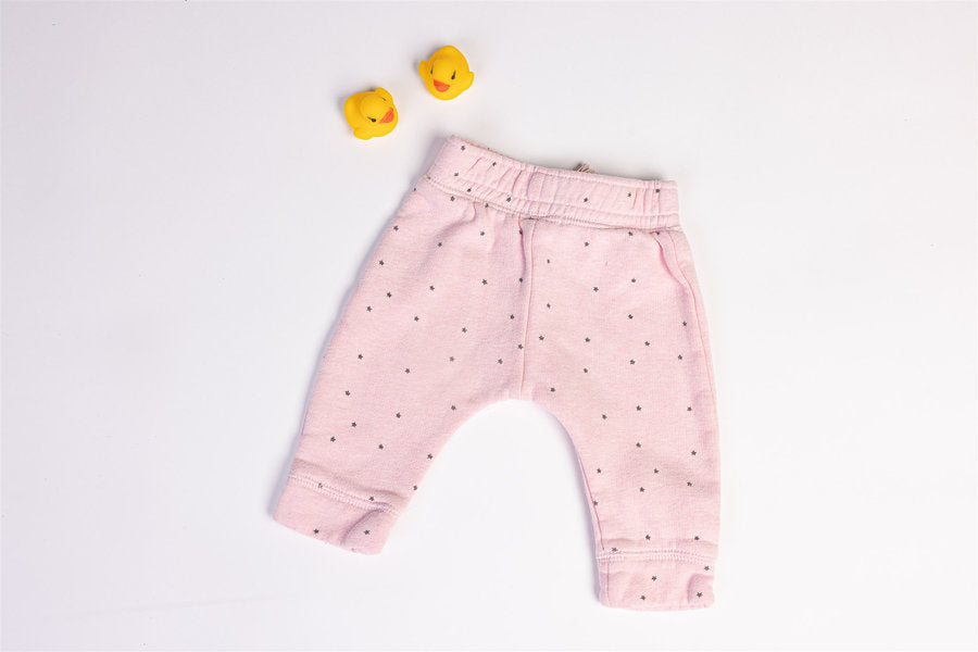 Pink trousers with black stars
