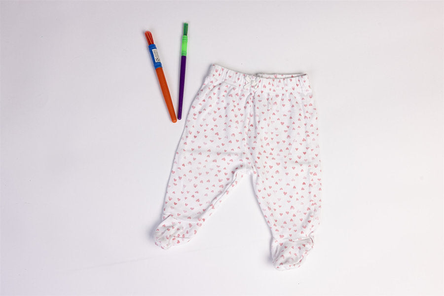 White footed trousers with pink heart