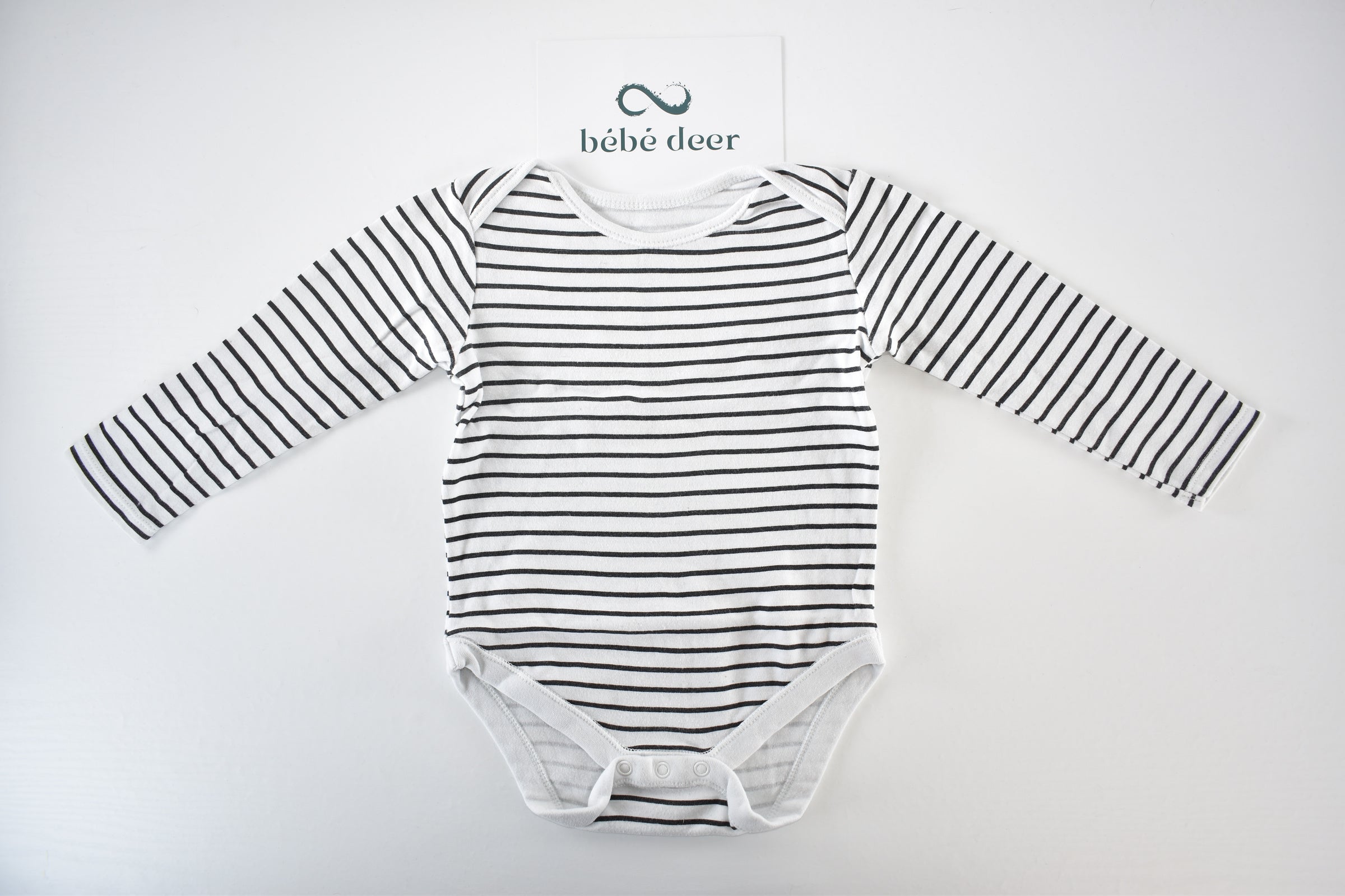 Striped black and white long sleeve bodysuit