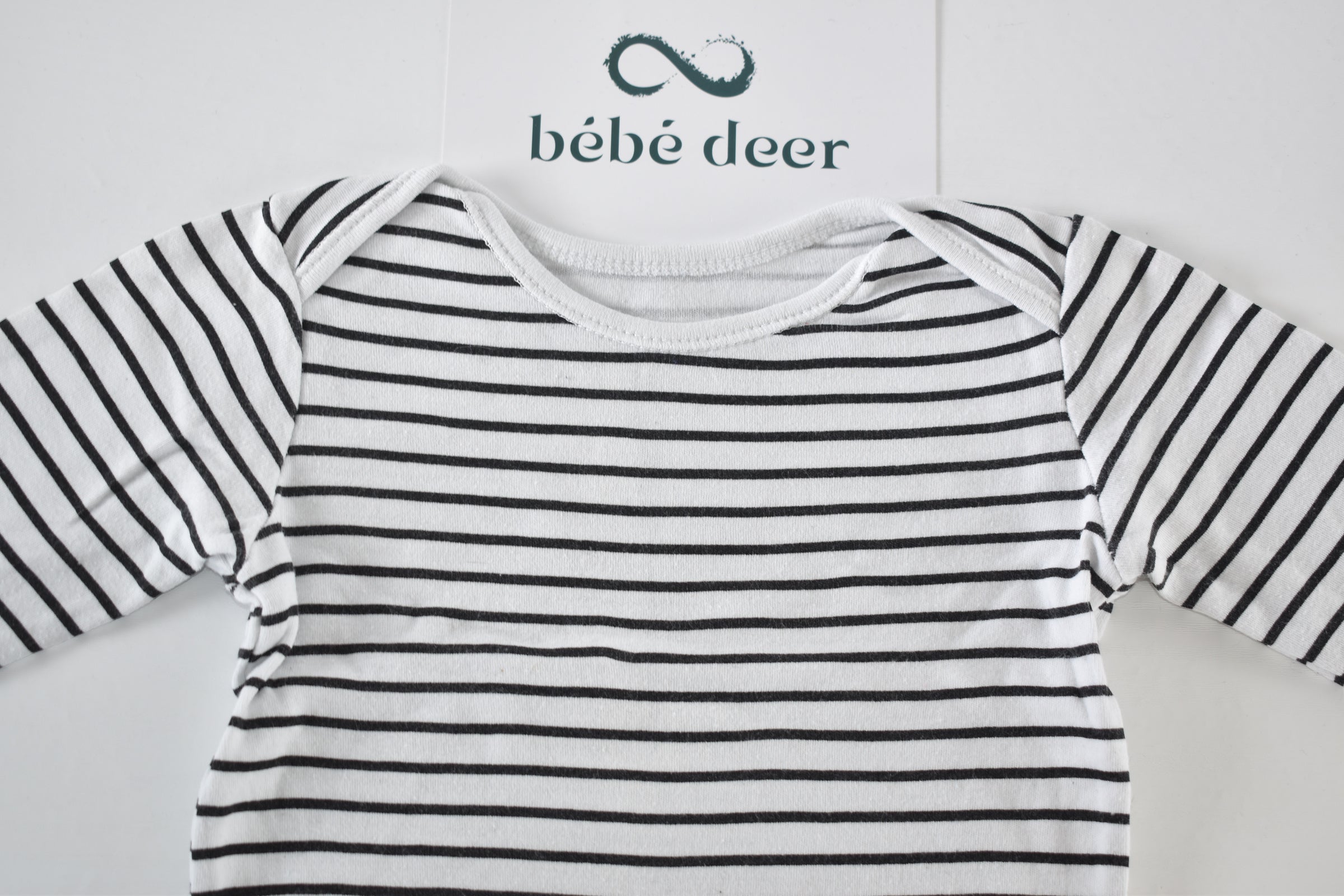 Striped black and white long sleeve bodysuit
