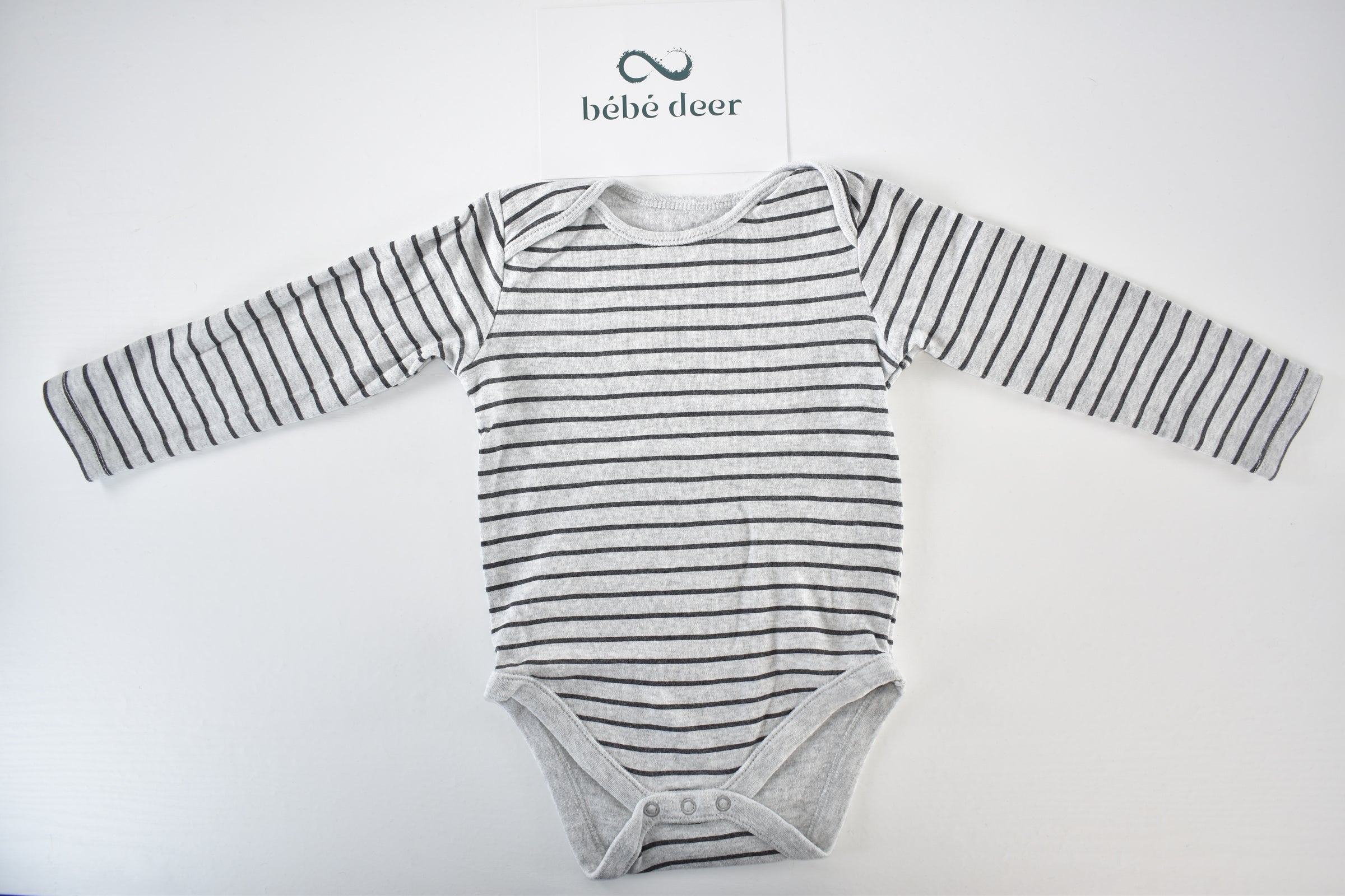 Grey and black striped long sleeve bodysuit