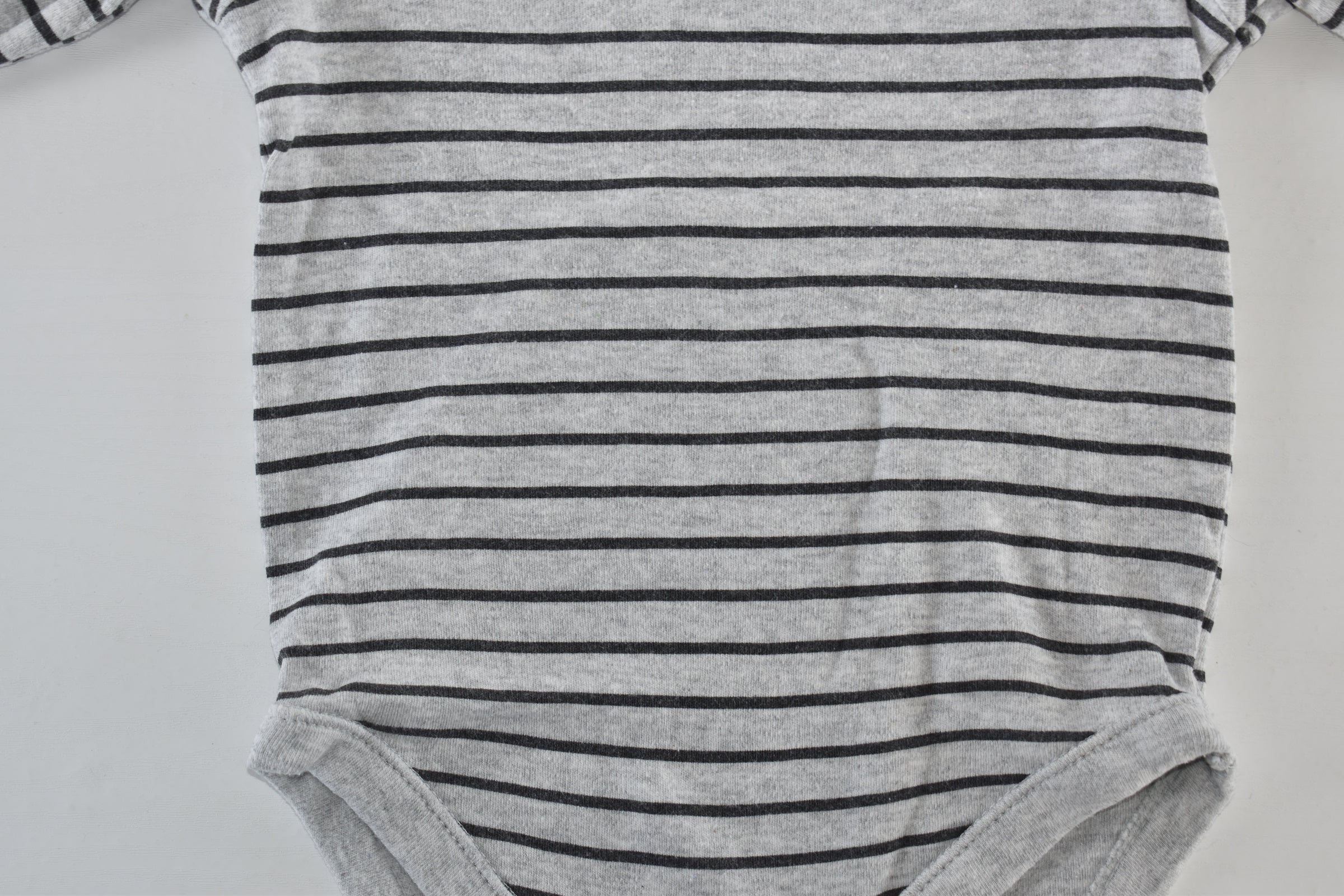 Grey and black striped long sleeve bodysuit