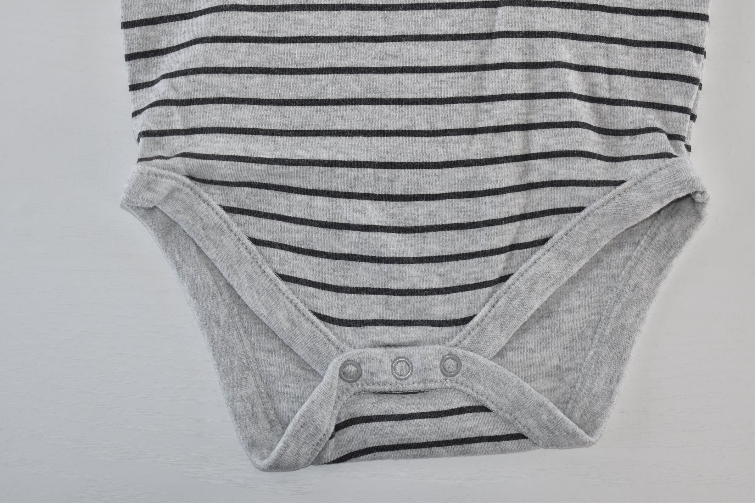Grey and black striped long sleeve bodysuit