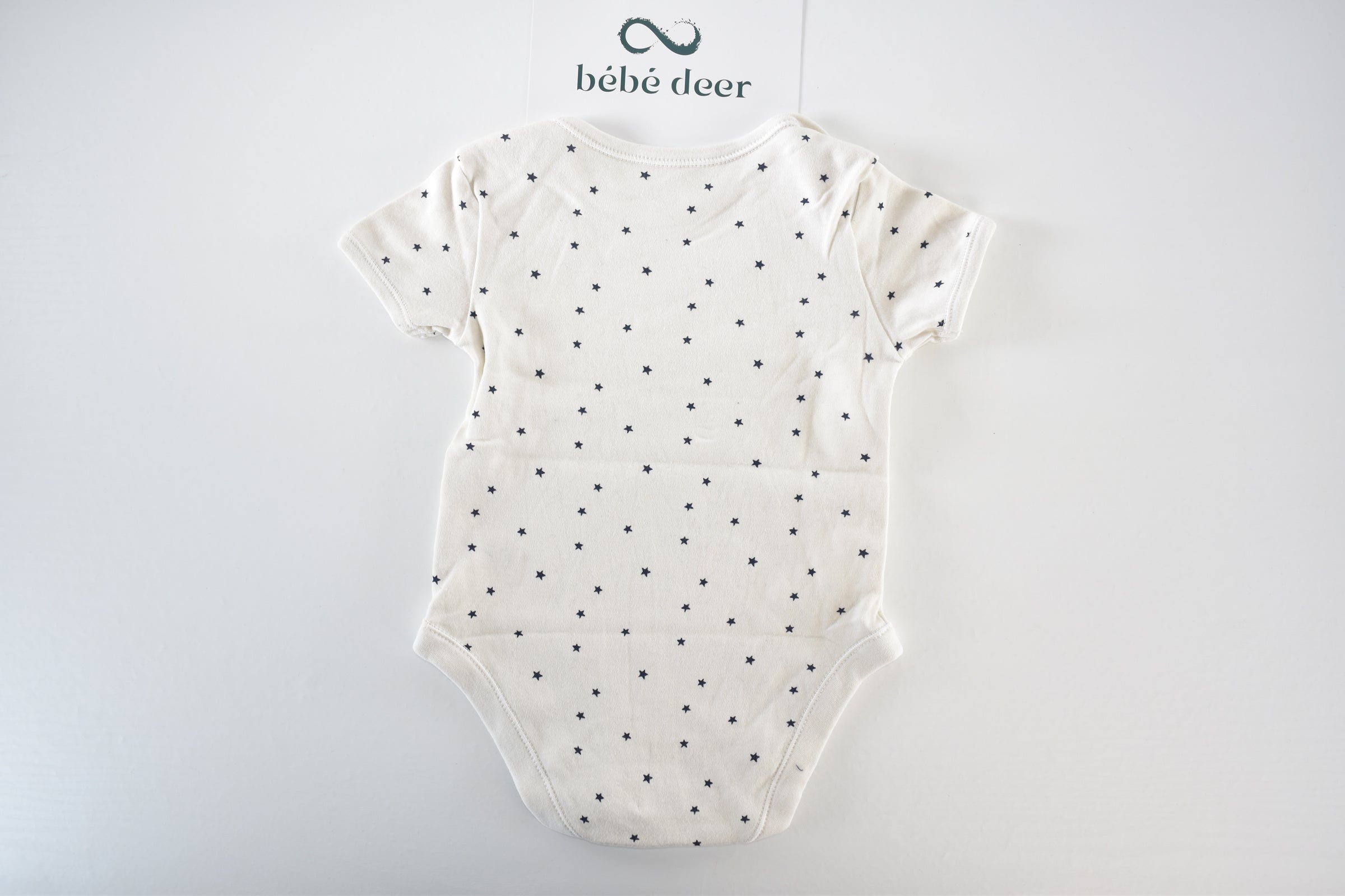 Set of 4 patterned bodysuits