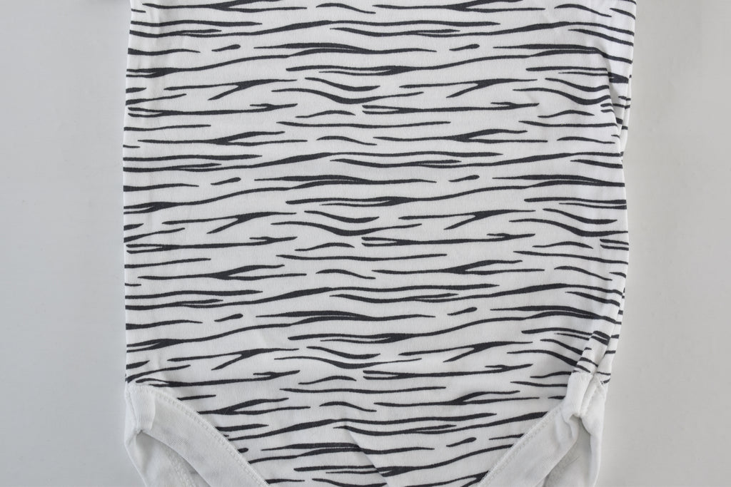 Set of 4 patterned bodysuits