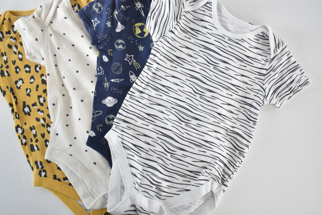 Set of 4 patterned bodysuits