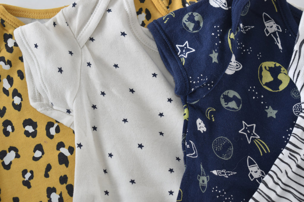 Set of 4 patterned bodysuits