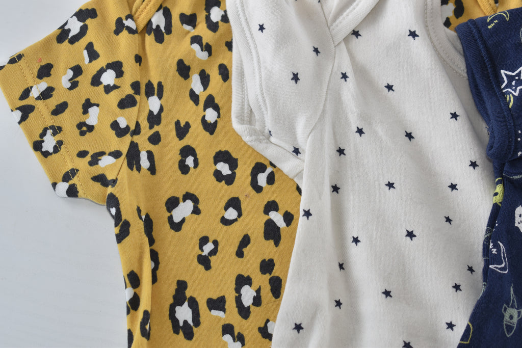 Set of 4 patterned bodysuits