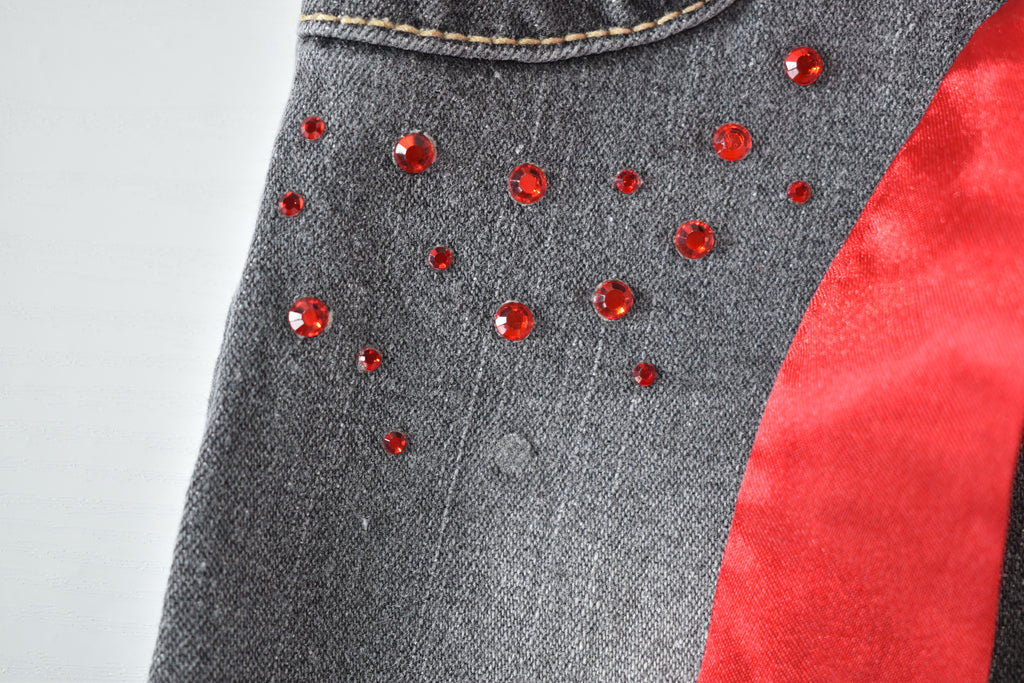 Butterfly embroidered jeans with red belt