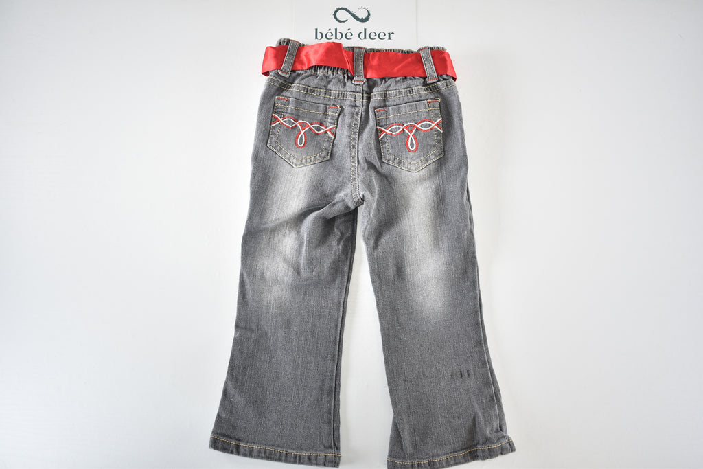 Butterfly embroidered jeans with red belt