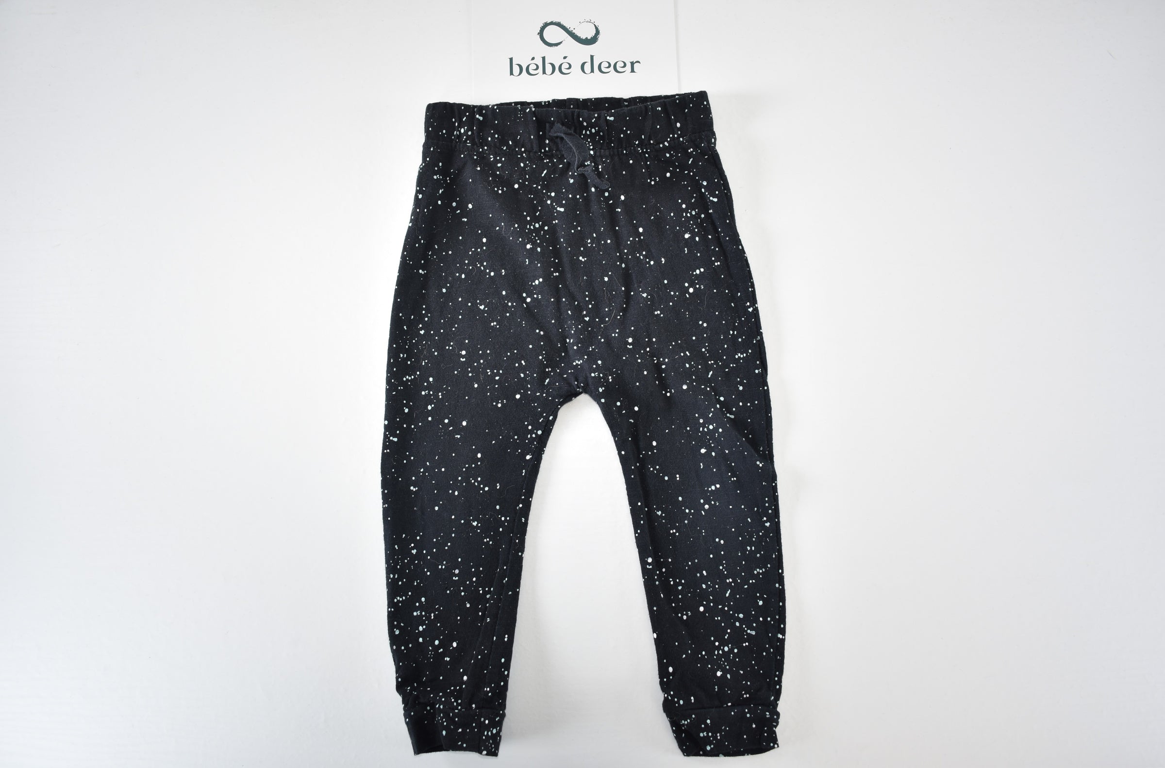 Speckled black trousers