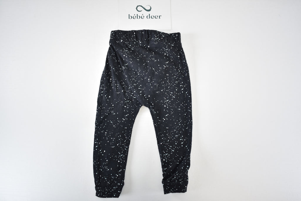 Speckled black trousers
