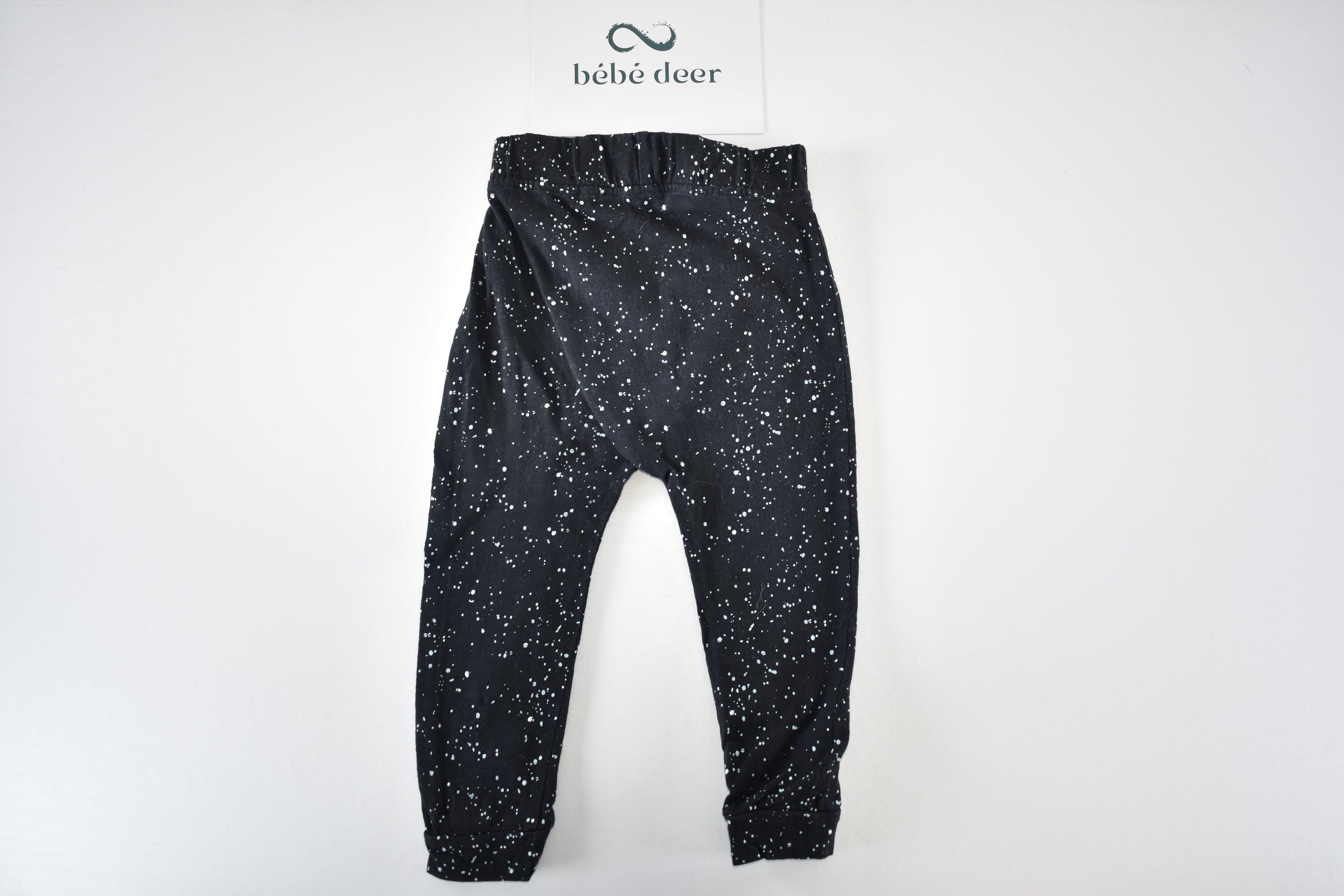 Speckled black trousers