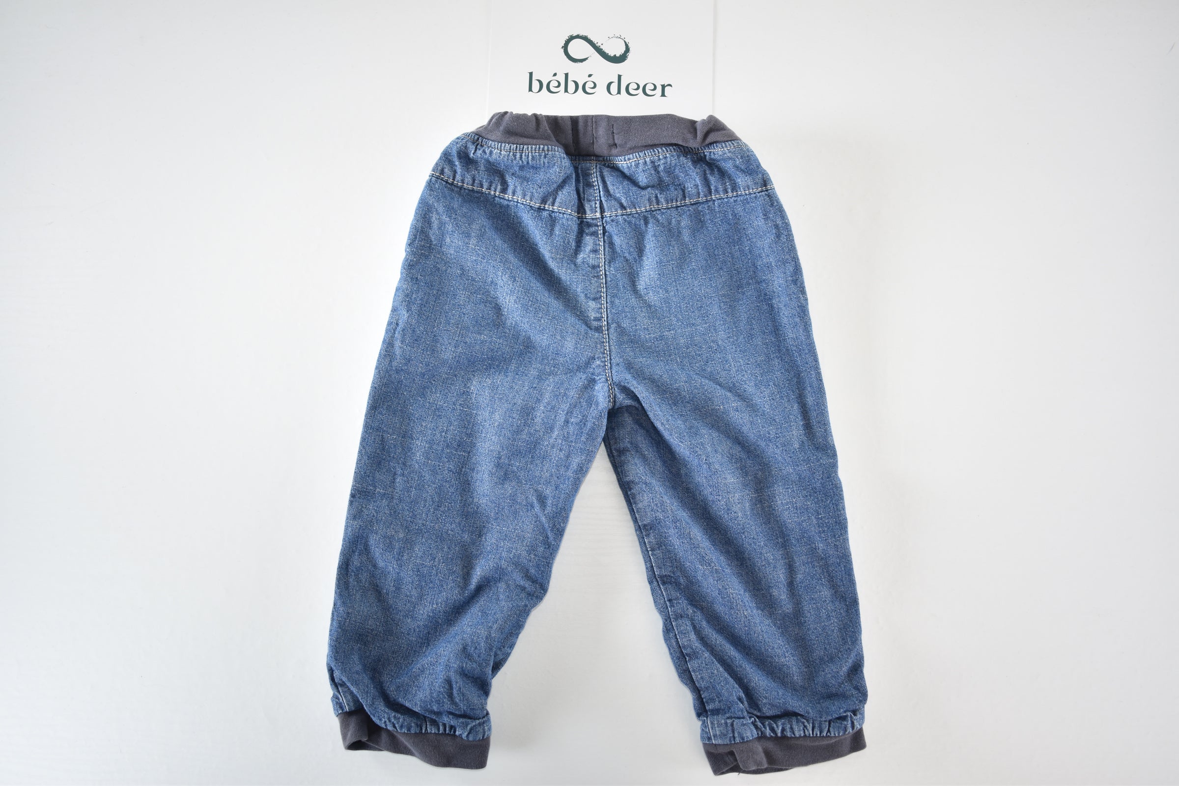 Denim trousers with embroidered car