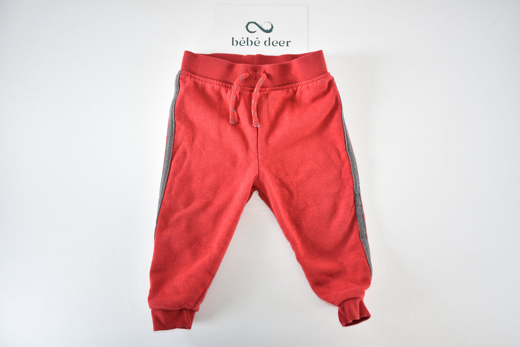 Red trousers with grey side panels