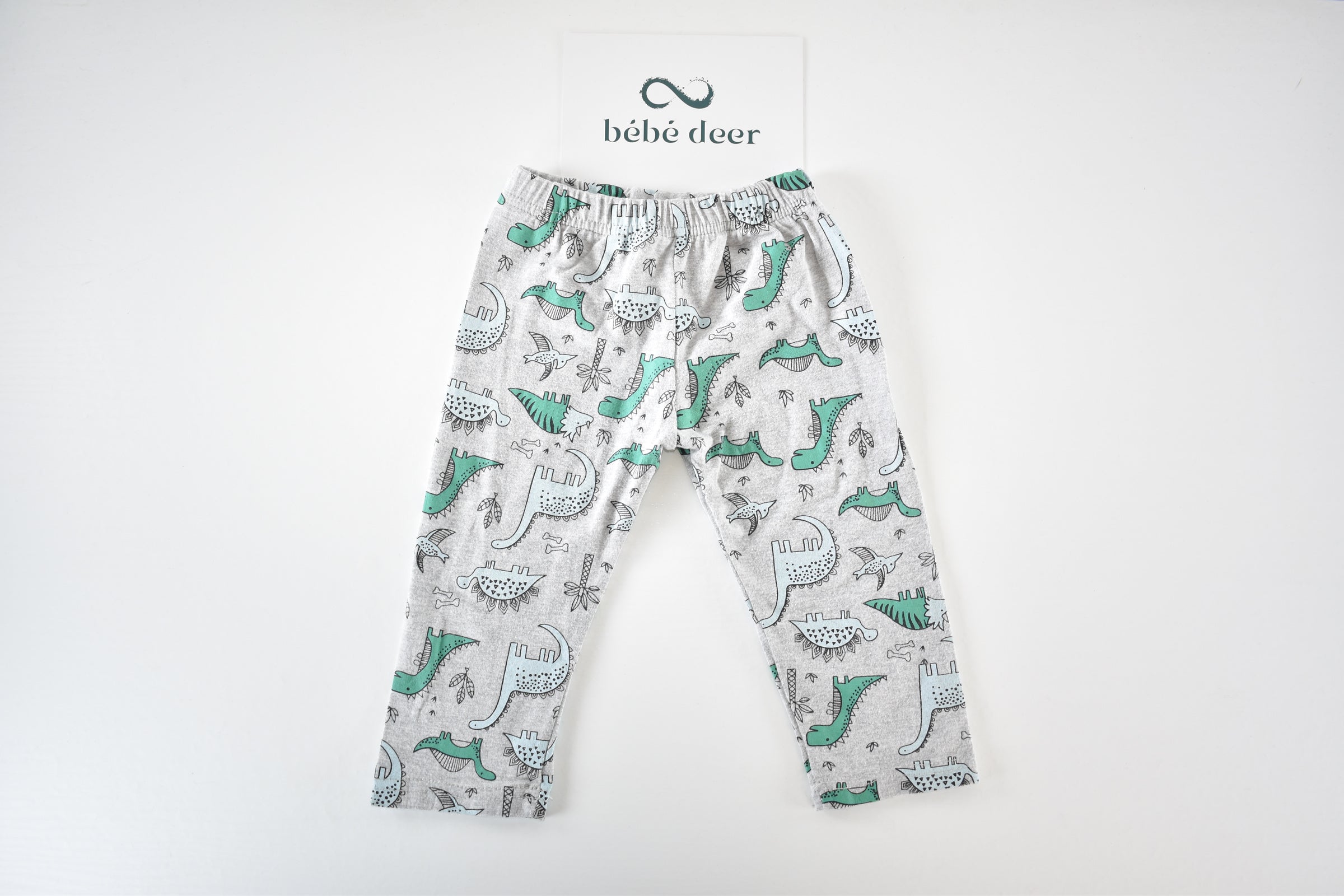 Dinosaur print trousers