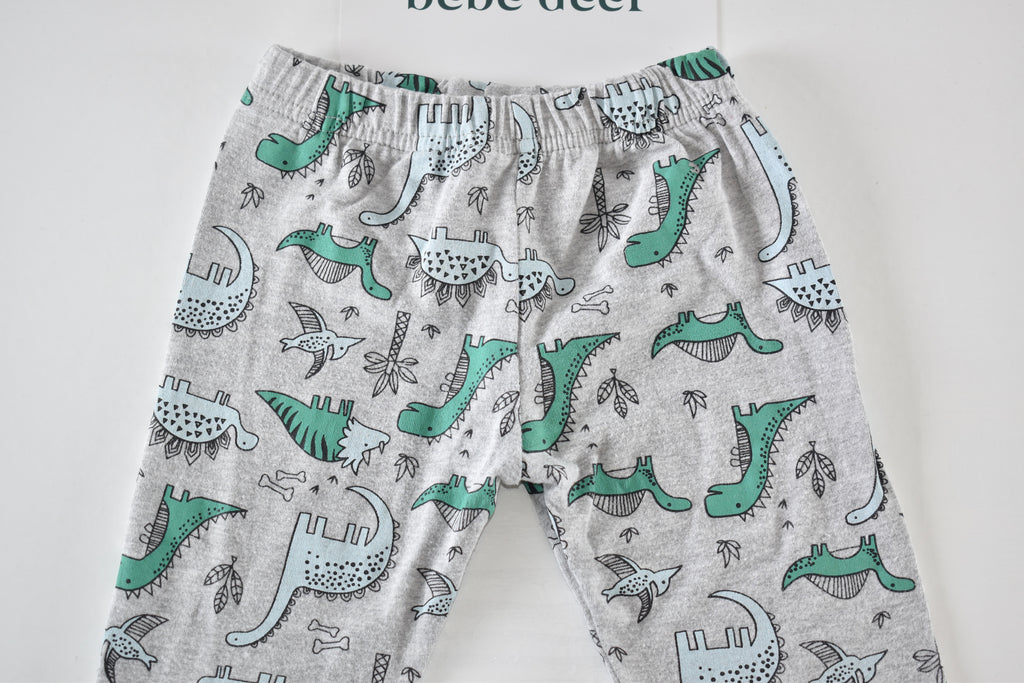 Dinosaur print trousers