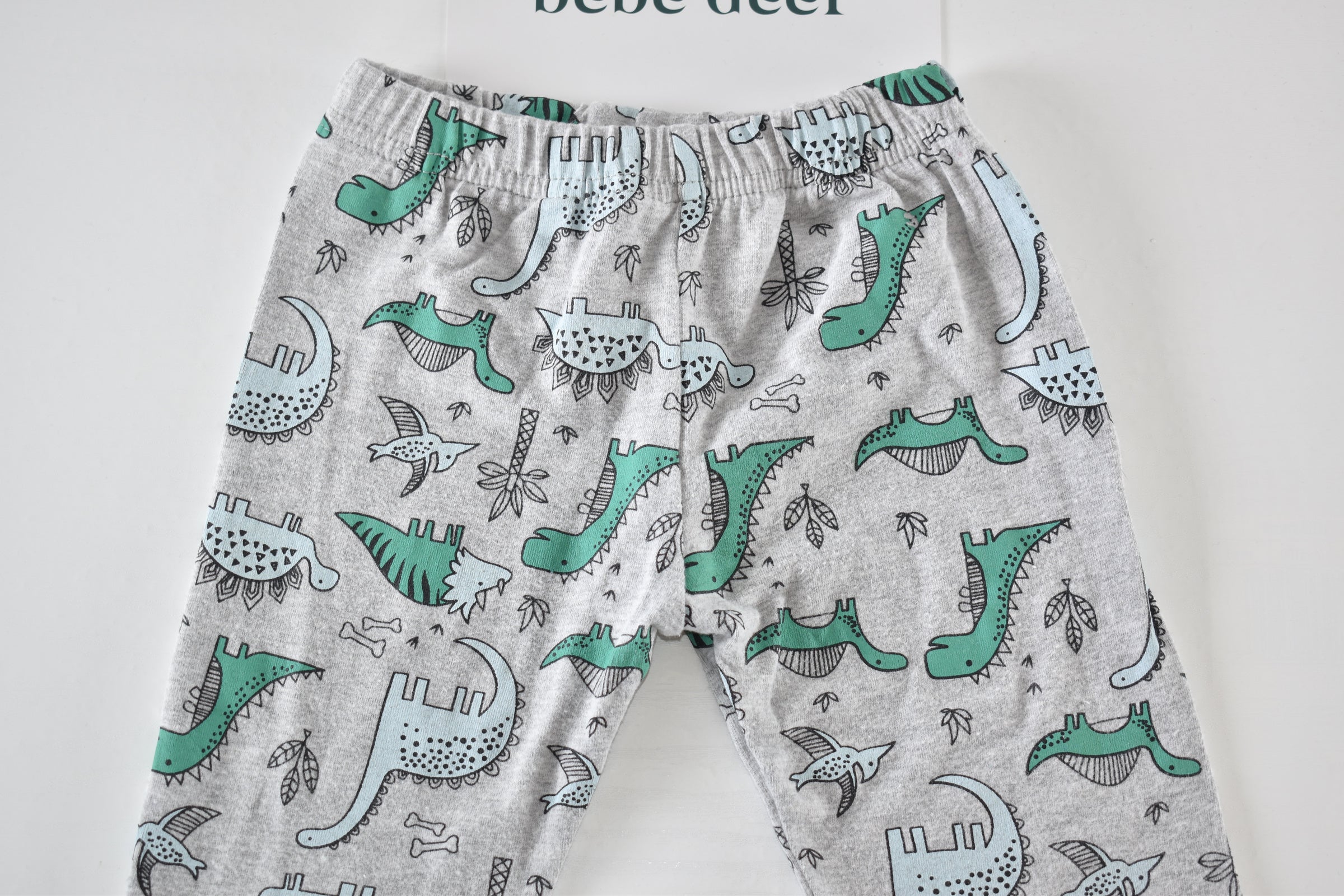 Dinosaur print trousers