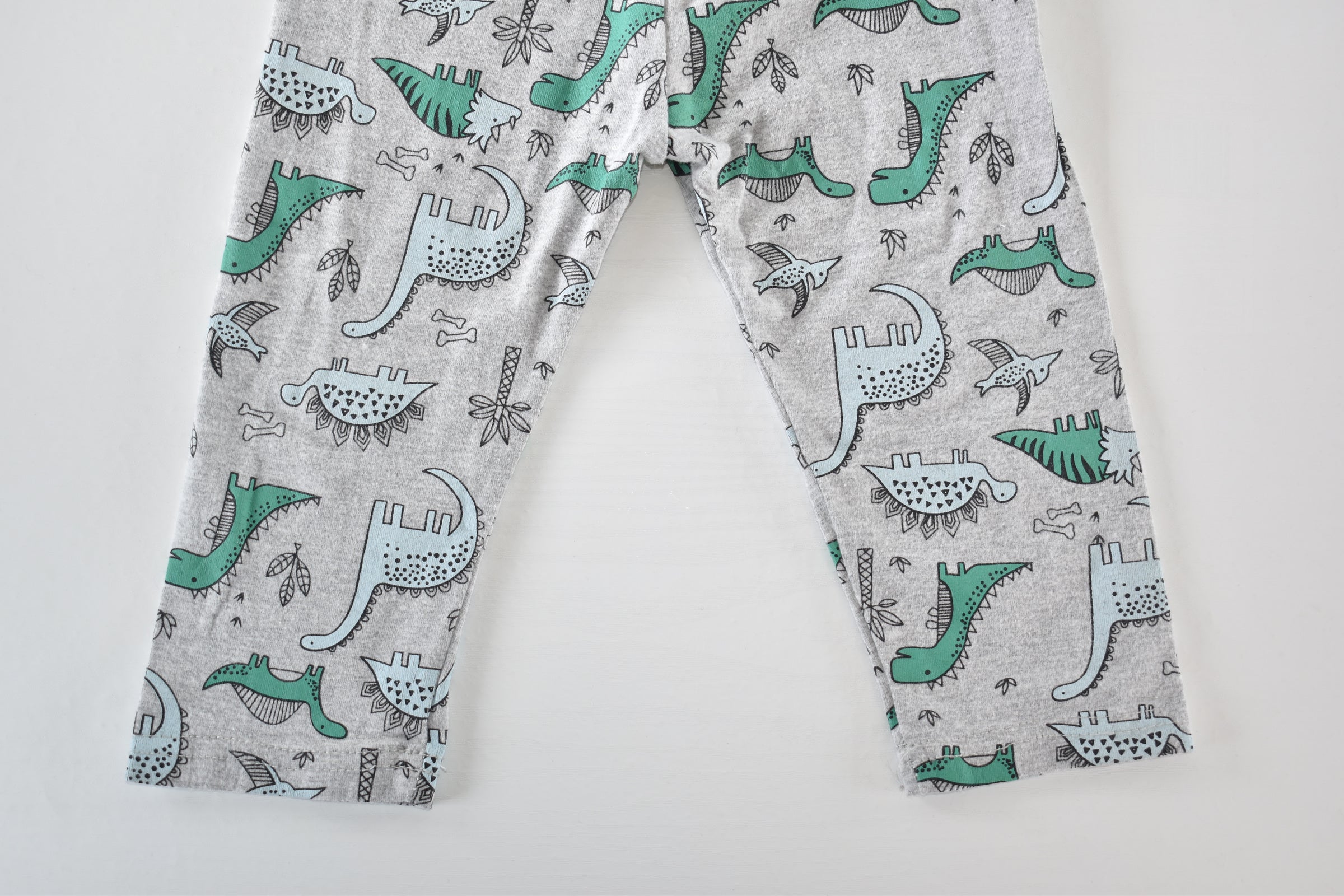 Dinosaur print trousers