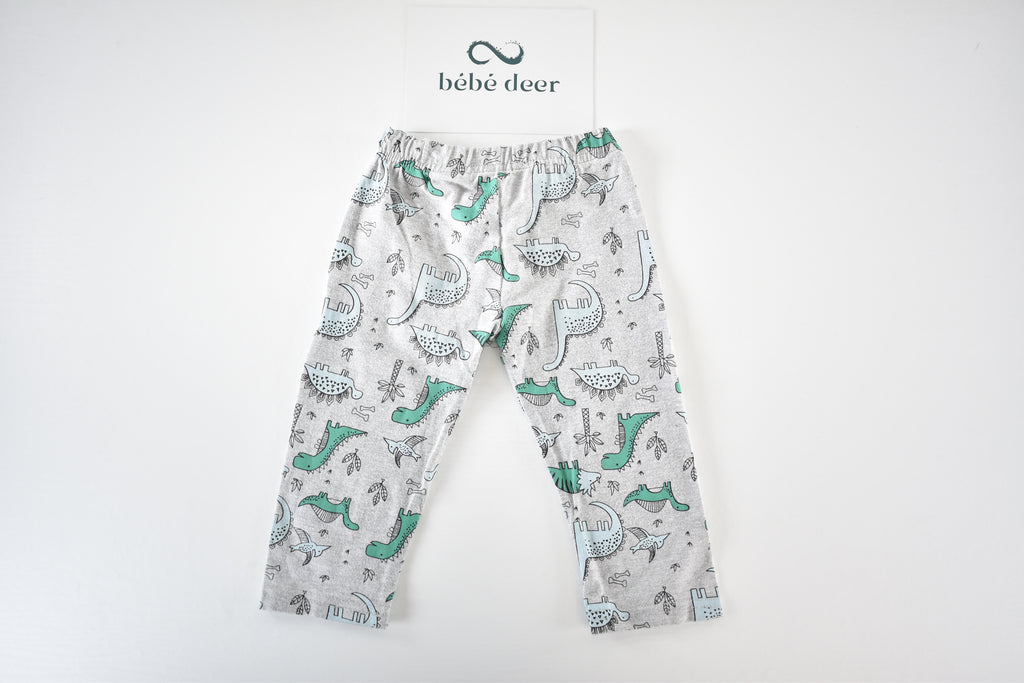 Dinosaur print trousers