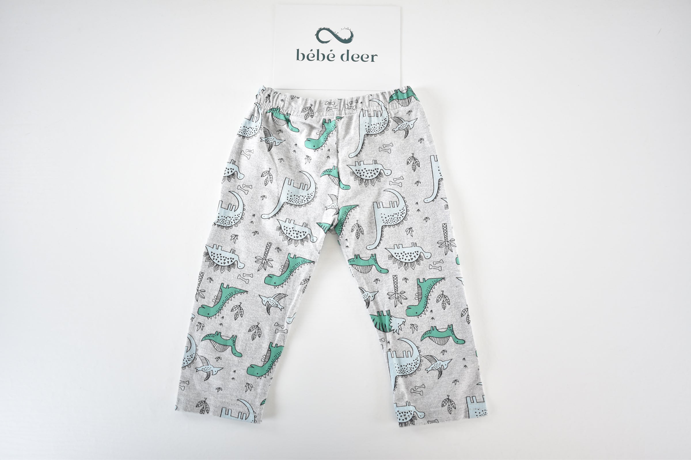 Dinosaur print trousers
