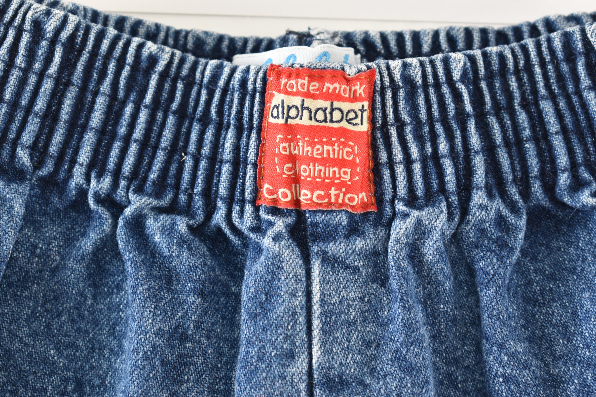 Denim trousers with embroidered detail