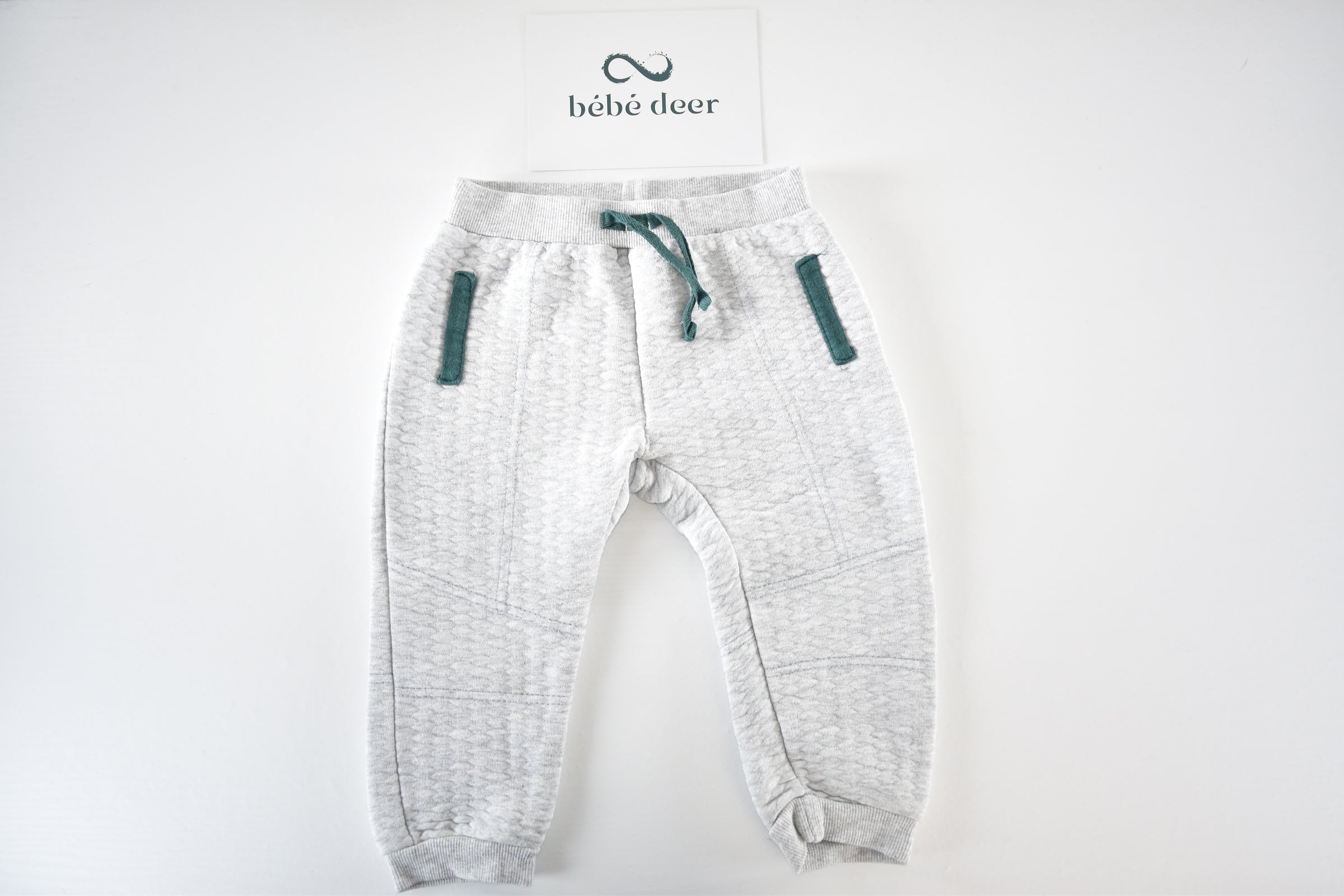 Grey quilted trousers