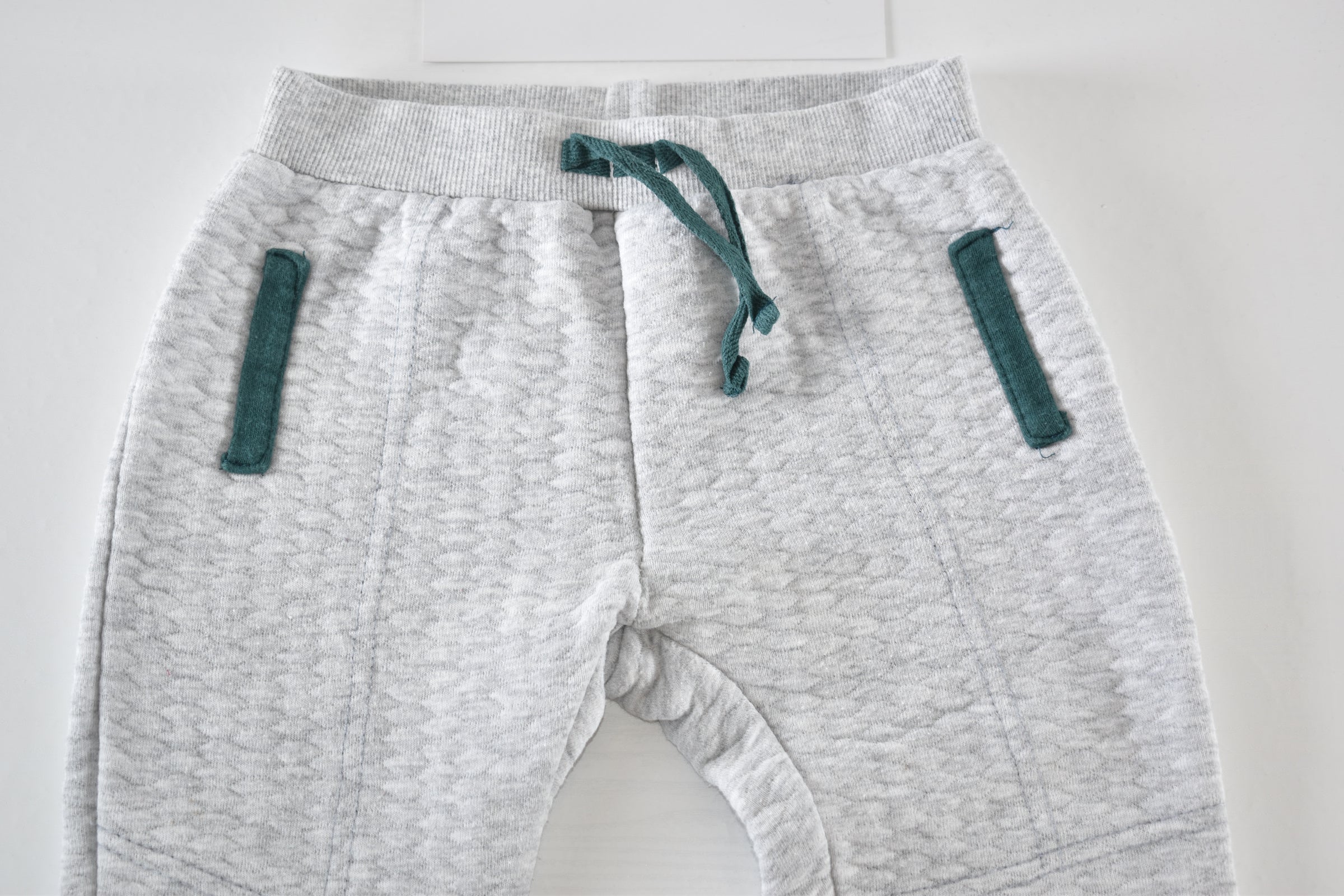 Grey quilted trousers