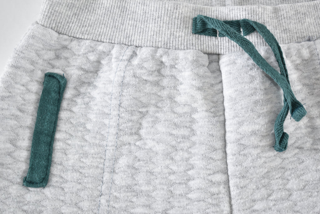 Grey quilted trousers