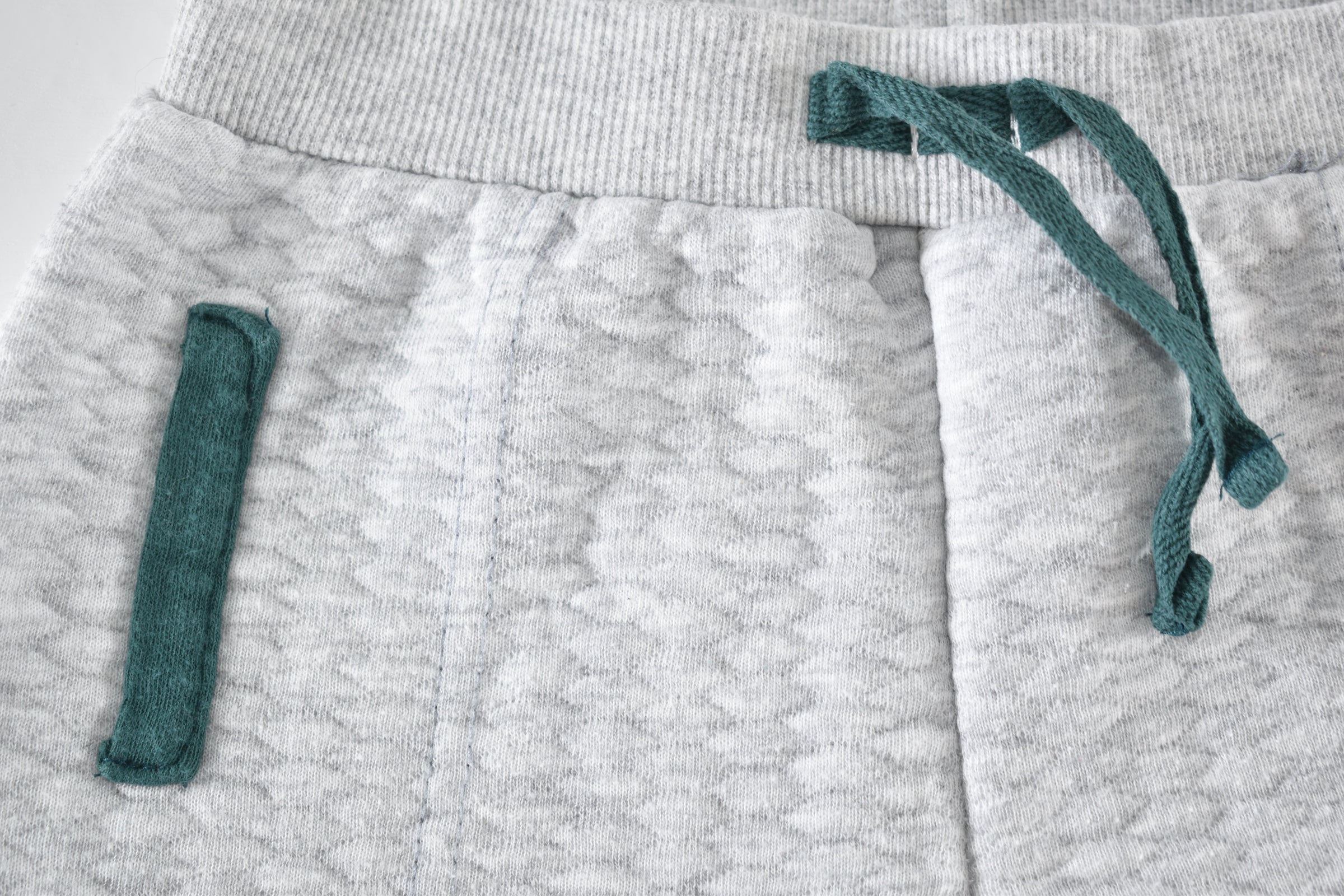 Grey quilted trousers