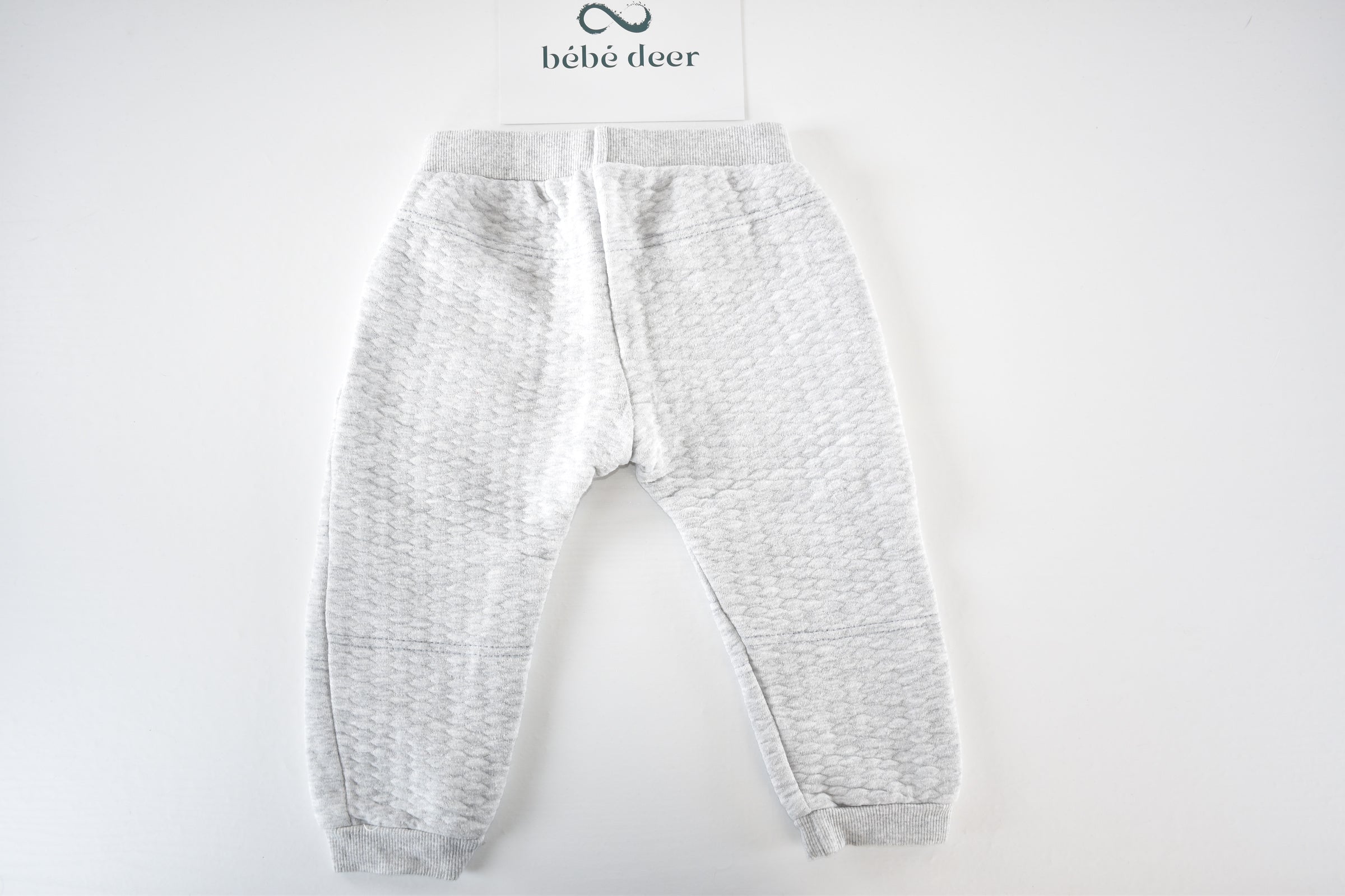 Grey quilted trousers