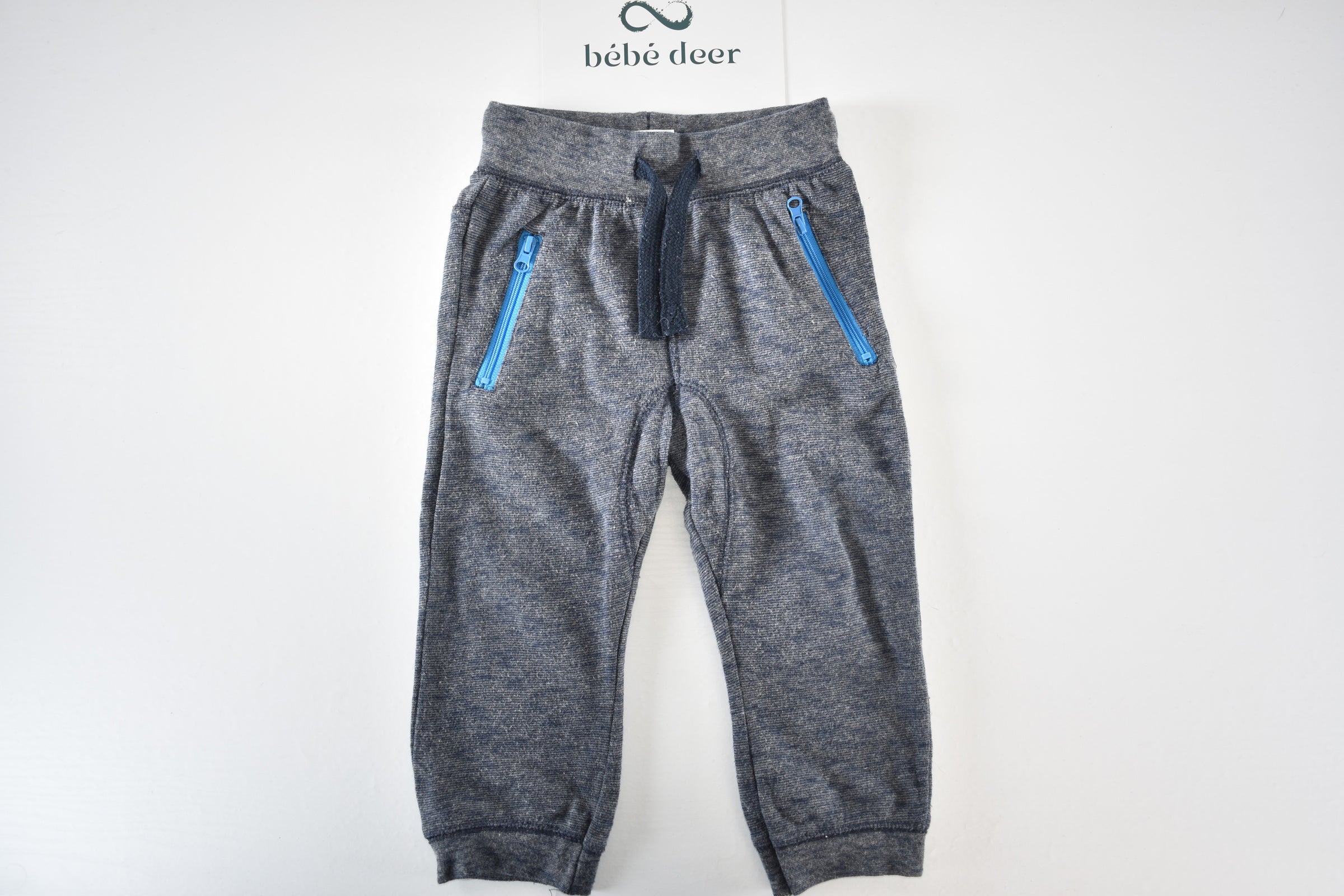 Grey marl trousers with zip pockets