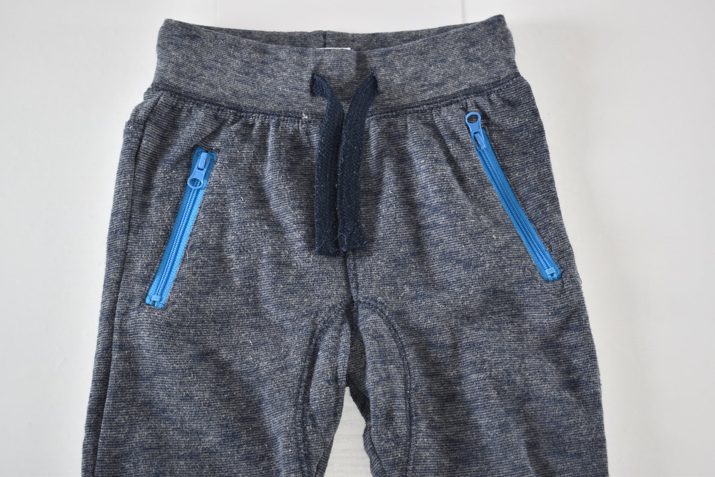 Grey marl trousers with zip pockets