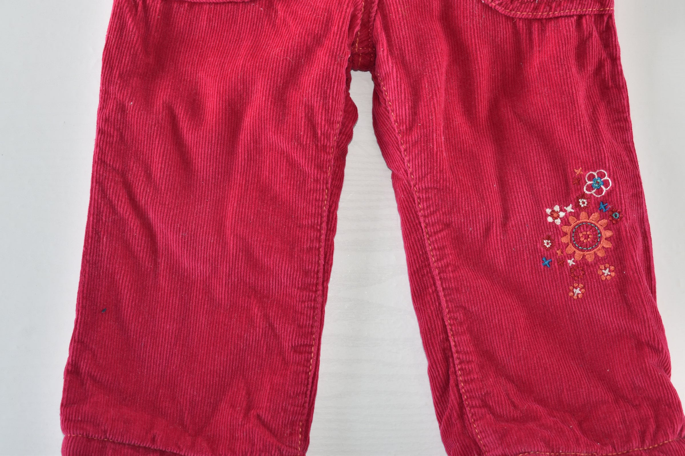 Pink corduroy embroidered trousers