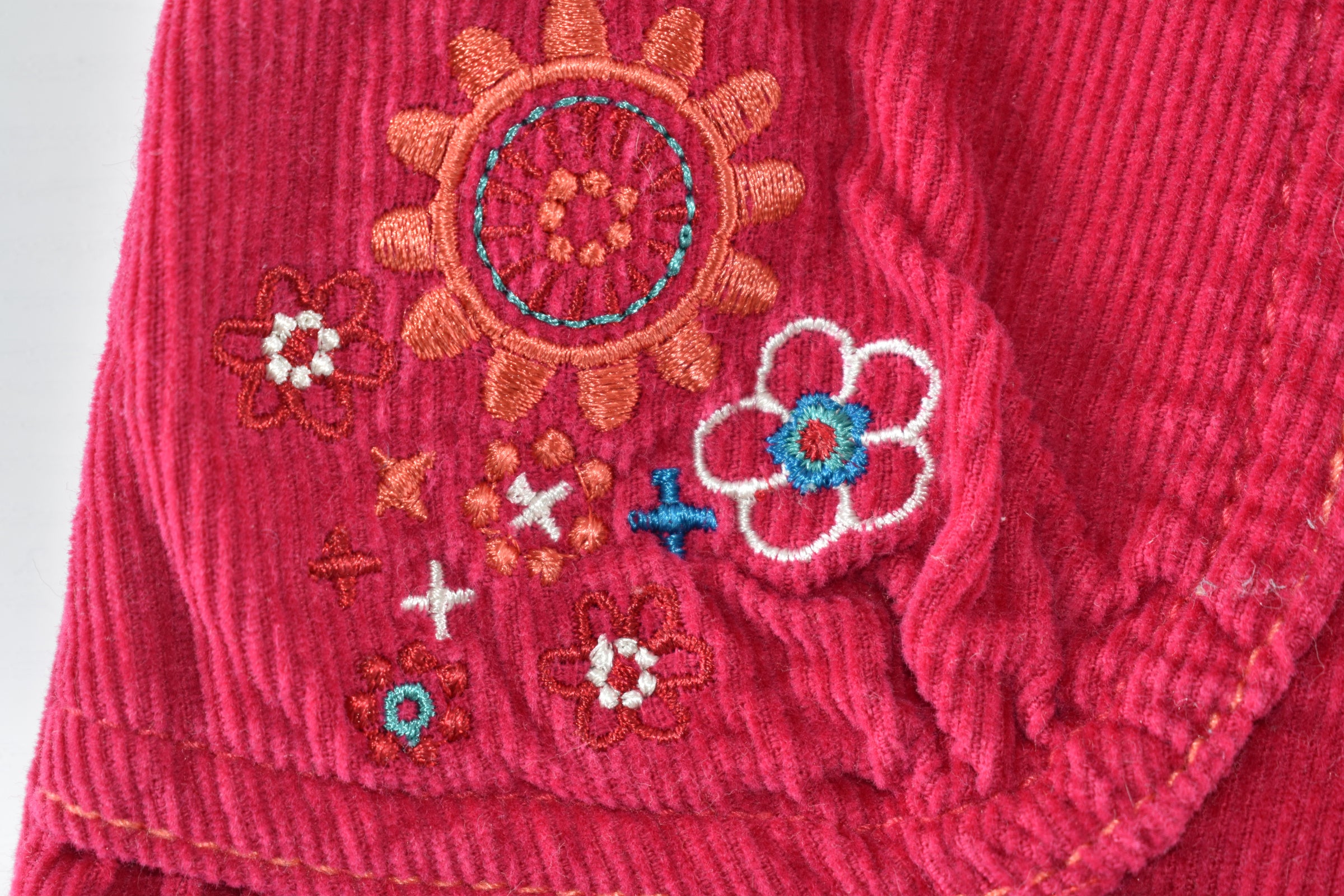 Pink corduroy embroidered trousers