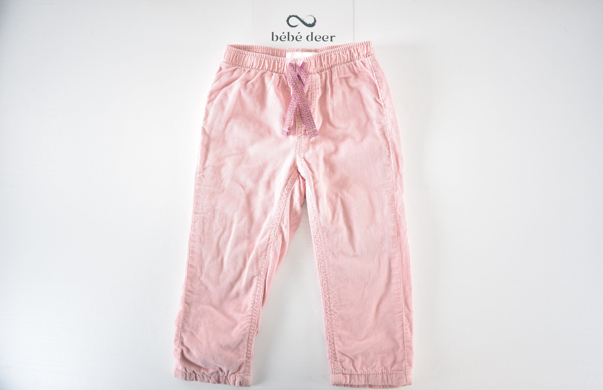 Soft pink lined corduroy trousers