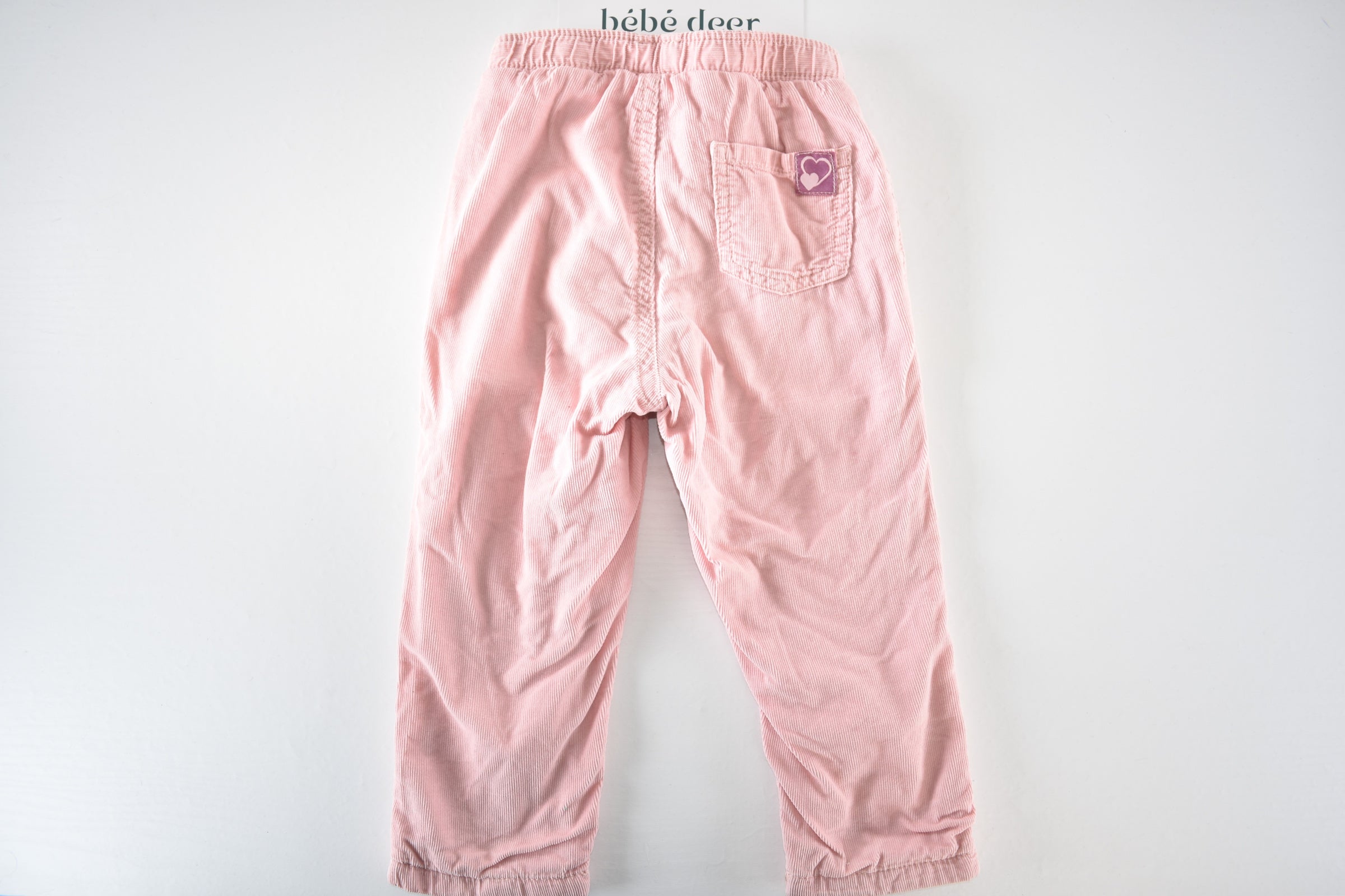 Soft pink lined corduroy trousers