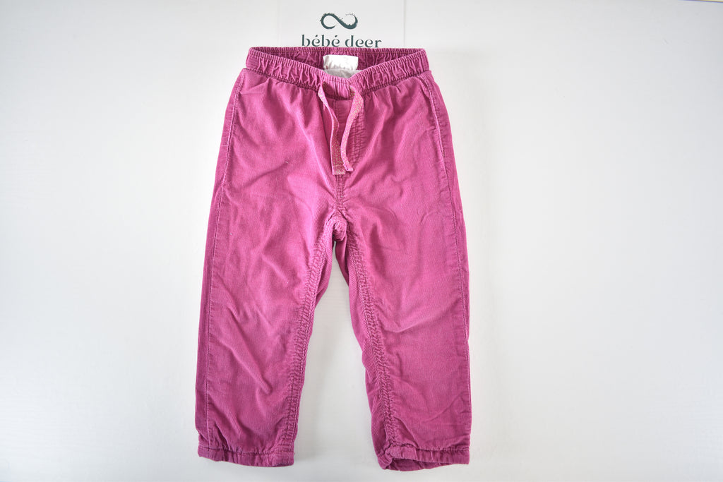 Bright pink lined corduroy trousers